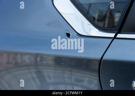 New York, United States. 07th Sep, 2020. Police investigate overnight shooting in Brooklyn and found stray bullet hit the car in Brooklyn New York on September 7, 2020. There were % wounded victims of this shooting and driver of this car found hole on the passenger side made by stray bullet. (Photo by Lev Radin/Sipa USA) Credit: Sipa USA/Alamy Live News Stock Photo