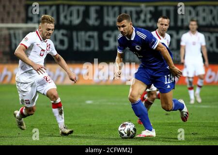 Zenica, Bosnia and Herzegovina. 7th Sep, 2020. Edin Dzeko (R, front) of Bosnia and Herzegovina (BiH) vies with Kamil Jozwiak (L, front) of Poland during the UEFA Nations League football match between BiH and Poland in Zenica, Bosnia and Herzegovina, on Sept. 7, 2020. Credit: Nedim Grabovica/Xinhua/Alamy Live News Stock Photo