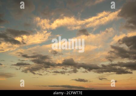 Dark and light clouds on a sunset sunrise day Stock Photo