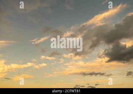 Dark and light clouds on a sunset sunrise day Stock Photo
