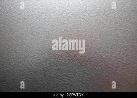 bumpy paint roller texture wall painted silver Stock Photo
