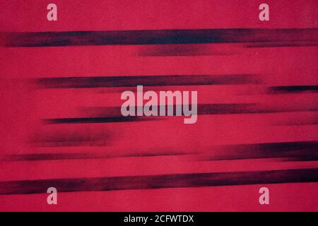 black line painted marks on red wall background Stock Photo