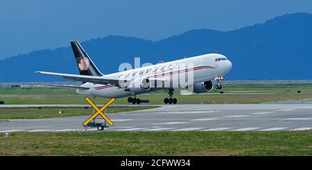 Richmond, British Columbia, Canada. 25th May, 2020. A Cargojet Airways Boeing 767-300ER (C-GXAJ) cargo jet takes off from Vancouver International Airport. Credit: Bayne Stanley/ZUMA Wire/Alamy Live News Stock Photo