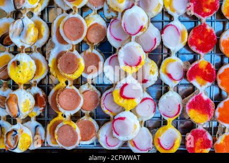 Fried quail egg sticks (Khanom Krok Khai Nok Krata in Thai language) in Thai style recipe. This snack is among the most popular in street food of Thai Stock Photo