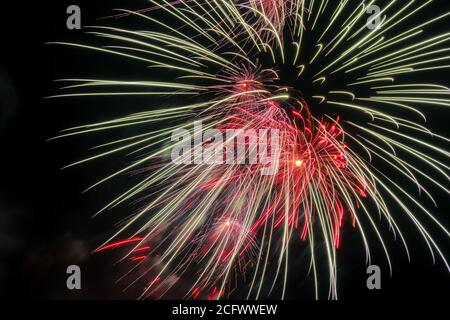 New Year celebration colorful fireworks. New year and holidays concept. Stock Photo