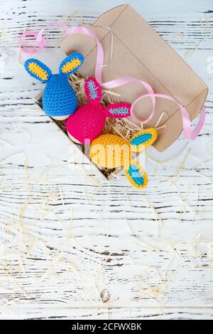 Cute creative photo with eggs as the Easter Bunny on a wooden background. Stock Photo