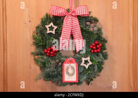 advent wreath with red bow as christmas decoration