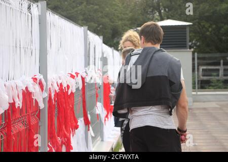 MINSK, BELARUS. Flag of Belarus made of ribbons on yard fence. White red white Stock Photo