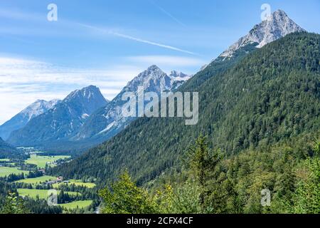 view on wetterstein mountains and leutasch valley from ederkanzel guest court restaurant in summer7 Stock Photo