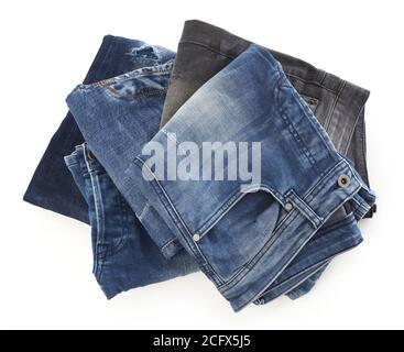 Stack of jeans isolated on white Stock Photo