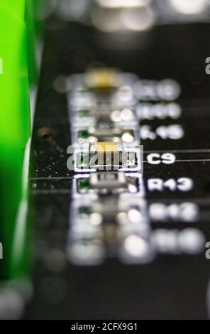 close up of isolated lone capacitor on circuit board Stock Photo