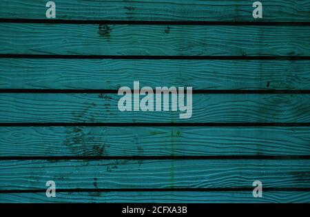 Dark blue colored old wooden plank wall background Stock Photo