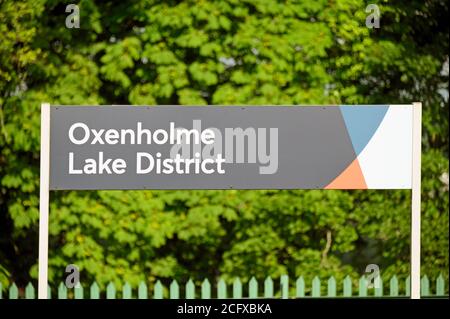 Rail Station nameboard. Oxenholme Lake District rail station, West Coast Main Line, Cumbria, England, United Kingdom, Europe. Stock Photo