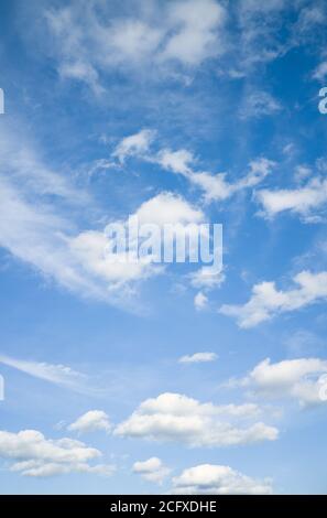 Beautiful vertical photo of light blue sky and white clouds, quality high detailed shoot. Stock Photo