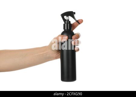 Female hand holds hairdressing spray, isolated on white background Stock Photo