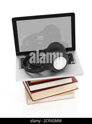 Laptop and headphones on a stack of books, white background Stock Photo