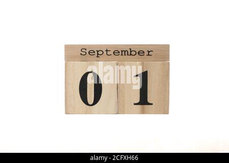 Wooden calendar with date September 1 isolated on white background Stock Photo