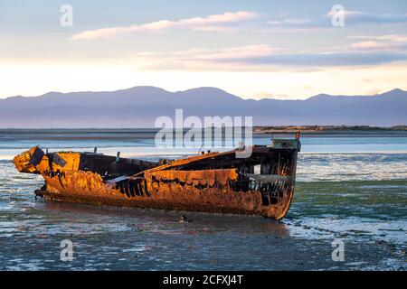 Wreck of the Janie Seddon, built in 1901, on the beach at Motueka, Nelson, South Island, New Zealand Stock Photo