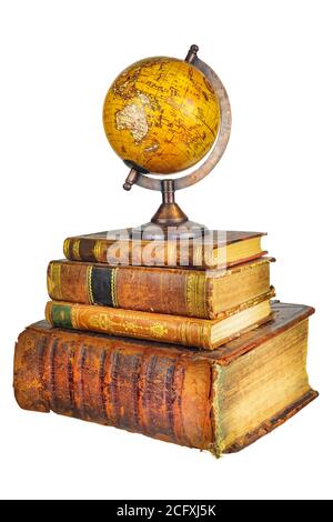 Pile of old used books with ancient globe isolated on a white background Stock Photo