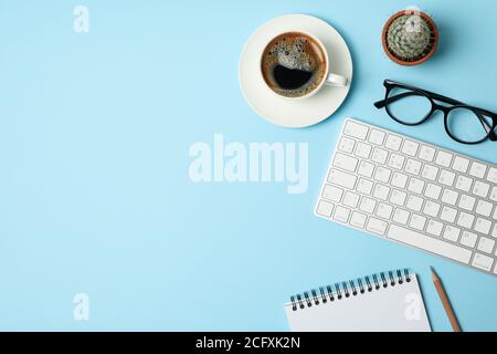 Composition with business accessories on blue background. Blogger workspace Stock Photo
