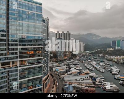 An aerial photograph taken above the Aberdeen Typhoon Shelter, showing residential housing in Ap Lei Chau, Hong Kong. Stock Photo