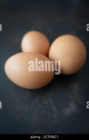 3 chicken fresh eggs laid at home farm Stock Photo