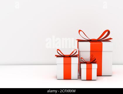 Gift boxes and empty white wall Stock Photo
