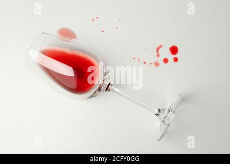 Glass of wine on white background, top view
