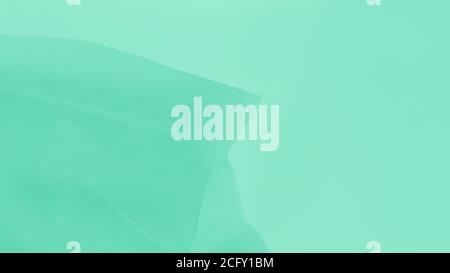 Soft light green mint flowing fabric, gradient green color panorama background Stock Photo