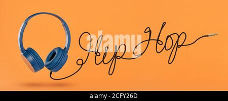 Headphones with New York cable on orange background Stock Photo
