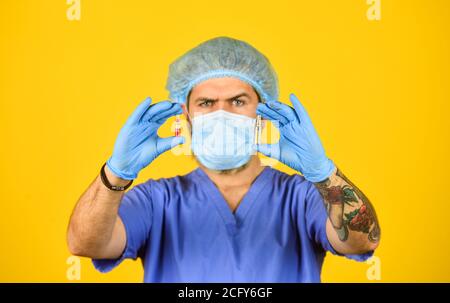 making virus test. developed vaccines. outbreak of new coronavirus in China. How virus is transmitted. health worker wear mask while research test tube in lab. more radical measures. selective focus. Stock Photo