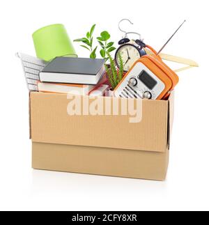 Cardboard box full with household stuff Stock Photo
