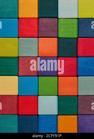 Multi-colored wooden toy blocks background Stock Photo
