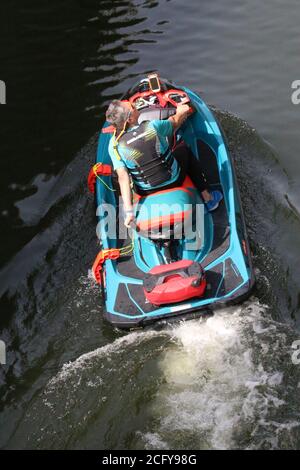 Personal Watercraft in lock to move upriver Stock Photo