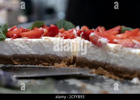 Delicious homemade traditional strawberry cheesecake in the cut Stock Photo