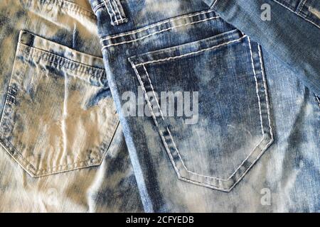 Top view Heap of blue jeans texture, Denim background. Stock Photo