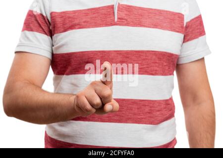 Close-up of adult man touching invisible or transparent blank copyspace as screen with index finger wearing summer attire isolated on white studio bac Stock Photo
