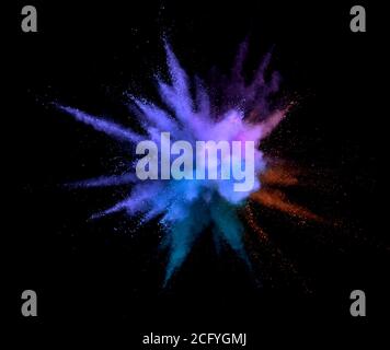 Abstract coloured powder explosion on black background Stock Photo