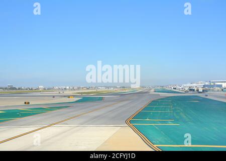 LOS ANGELES, CA, USA - MARCH 30, 2018 : The runway of Los Angeles LAX airport. Stock Photo