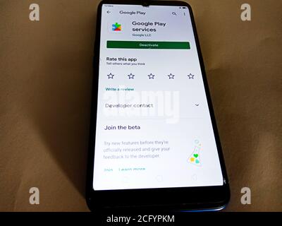 DISTRICT KATNI, INDIA - MAY 04, 2020: Google play services application software displayed on smart phone screen isolated. Stock Photo