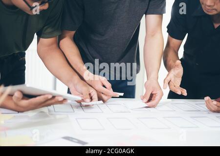 Programmer and UX UI designer working in a software development and coding technologies. Mobile and website design and programing development technolo Stock Photo