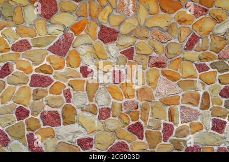 Background from silicon stones glued to concrete. Stock Photo