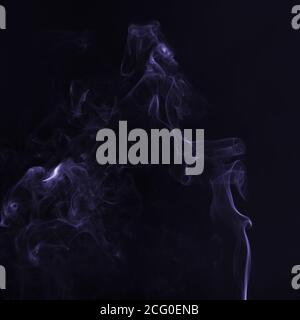 Beautiful ultra violet smoke against dark background Stock Photo