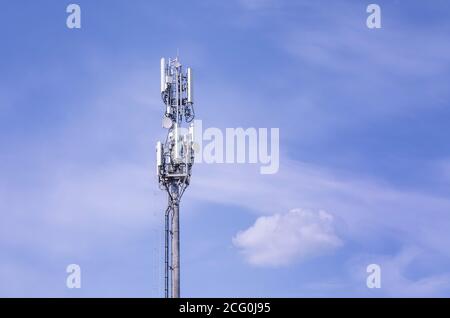 Cellular phone antennas 5G. Technology on the top of the telecommunication tower 4G, 3G . Telecommunication mast television antennas. Receiving and Stock Photo