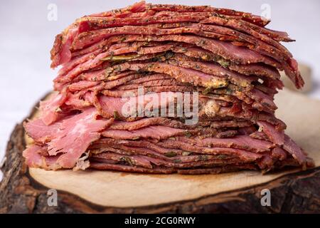 stack of sliced pastrami meat Stock Photo