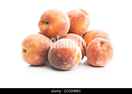 Fresh ripe bio peaches isolated on white background. Stock Photo