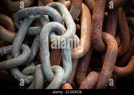 A close up of old rusty metal chain links Stock Photo