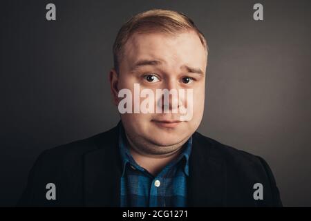 confident caucasian fat man looking at camera Stock Photo