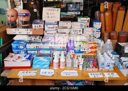 NEW YORK CITY, NY -22 AUG 2020- View of face masks, hand sanitizer, wipes and alcohol for sale on the street in Chinatown Manhattan, New York City, du Stock Photo