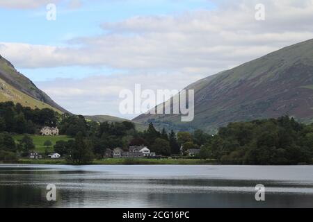 Lake District -Grasmere Lake with Mountain Range. You can walk along the Grasmere Lake and can capture lot of beautiful photoes. Fantastic view .